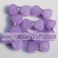 A Variety Of Bowknot Acrylic Lucite Cheap Beads With Silver Point On Surface