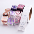 Self adhesive coated paper sticker