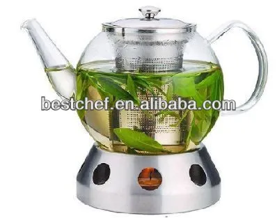 Glass herbal tea jug with stainless steel strainer and	lamp stand