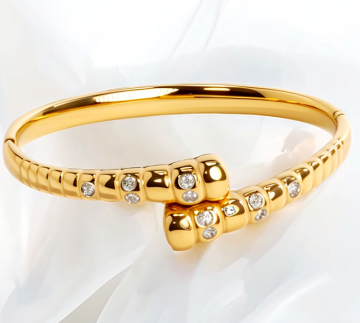 Pulseira de titânio entre banhada em ouro