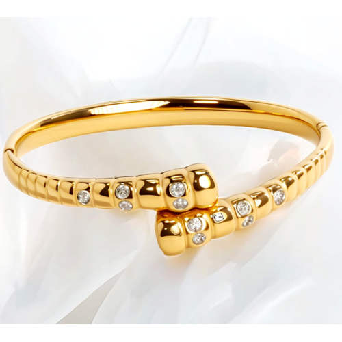 Brazalete de titanio entrelazado con torcedura de oro