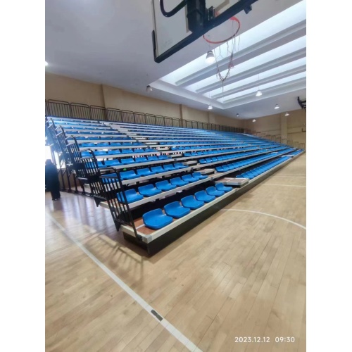 Electrical telescopic bleacher seat
