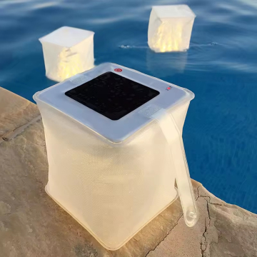 فانوس الطاقة الشمسية القابلة للنفخ قابلة للطي مع تصميم مقاوم للماء وشاحن هاتف 2 في 1 للاستخدام في الهواء الطلق في حالات الطوارئ