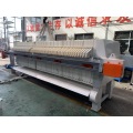 Hydraulic compacting membrane filter press