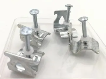Ceiling clip for powder actuated tools