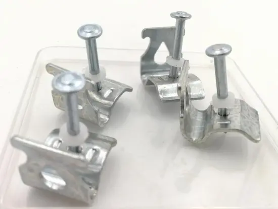 Ceiling clip for powder actuated tools