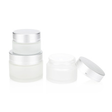 Vente en gros 10g 20g 30g 50g 100g Poctes cosmétiques en verre transparent durable givré avec des couvercles d&#39;argent