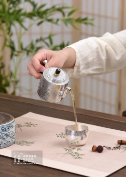 Handcrafted Orchid Silver Teapot for Refined Moments