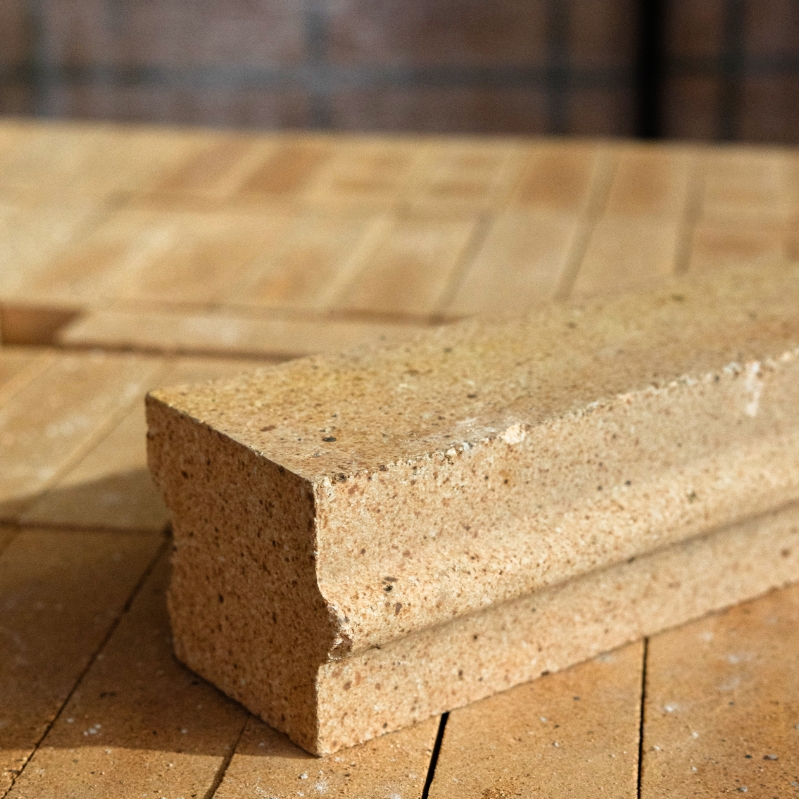 Glass shaped refractory bricks