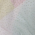 Rete in poliestere con stampa laminata a pois dorati a strisce sfumate