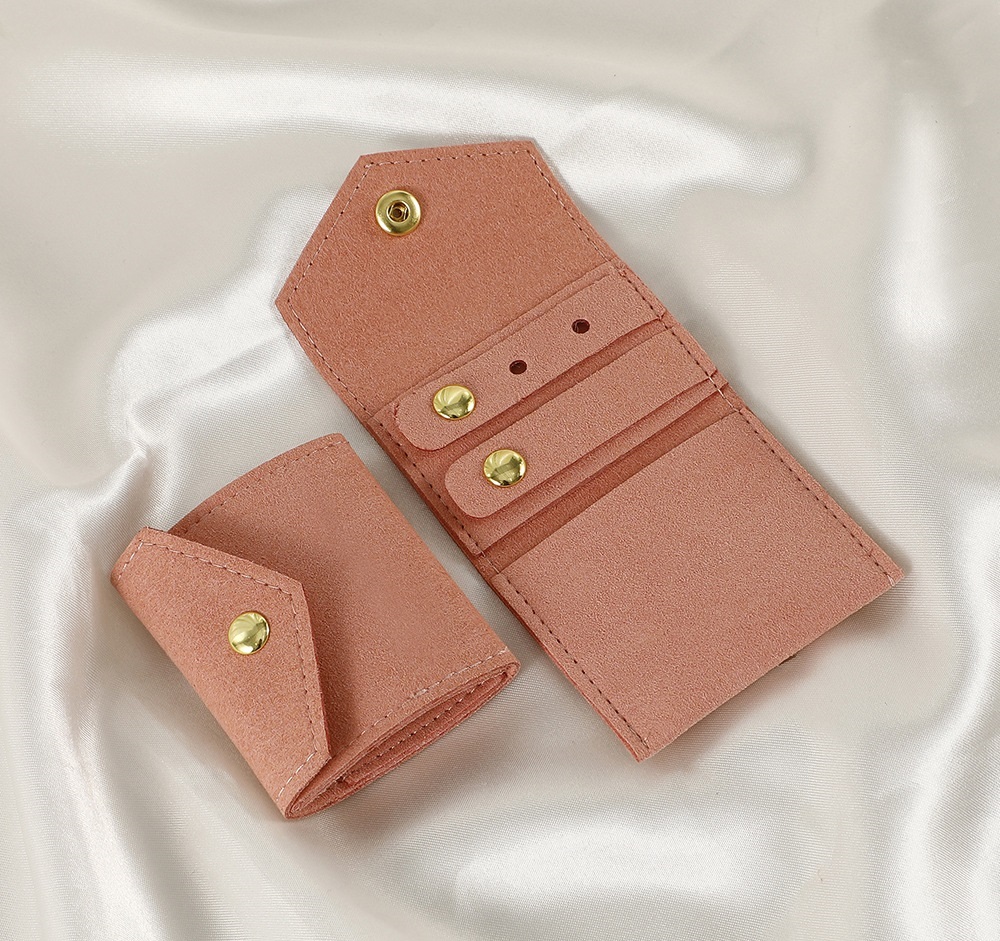 Portable slim jewelry storage pouch with snap button