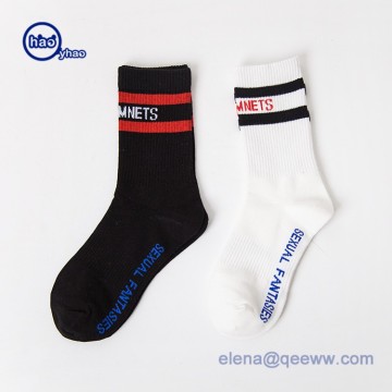 China socks factory custom logo black elite basketball socks versatility mid basketball socks
