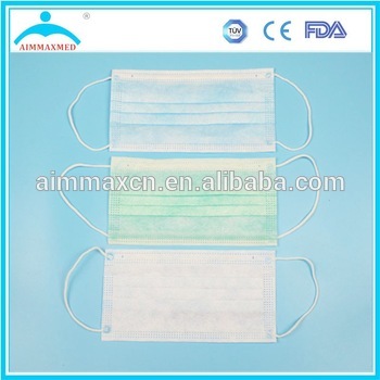 Disposable nonwoven surgical facemask with earloops