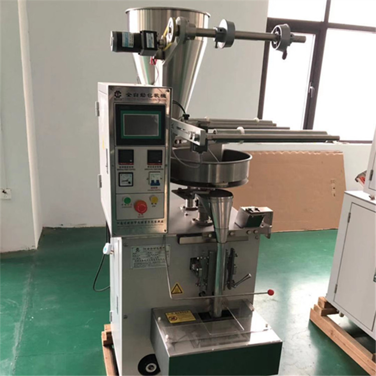 Automatic triangle bag of Tea packaging machine or Peanut or Coffee packaging machine price