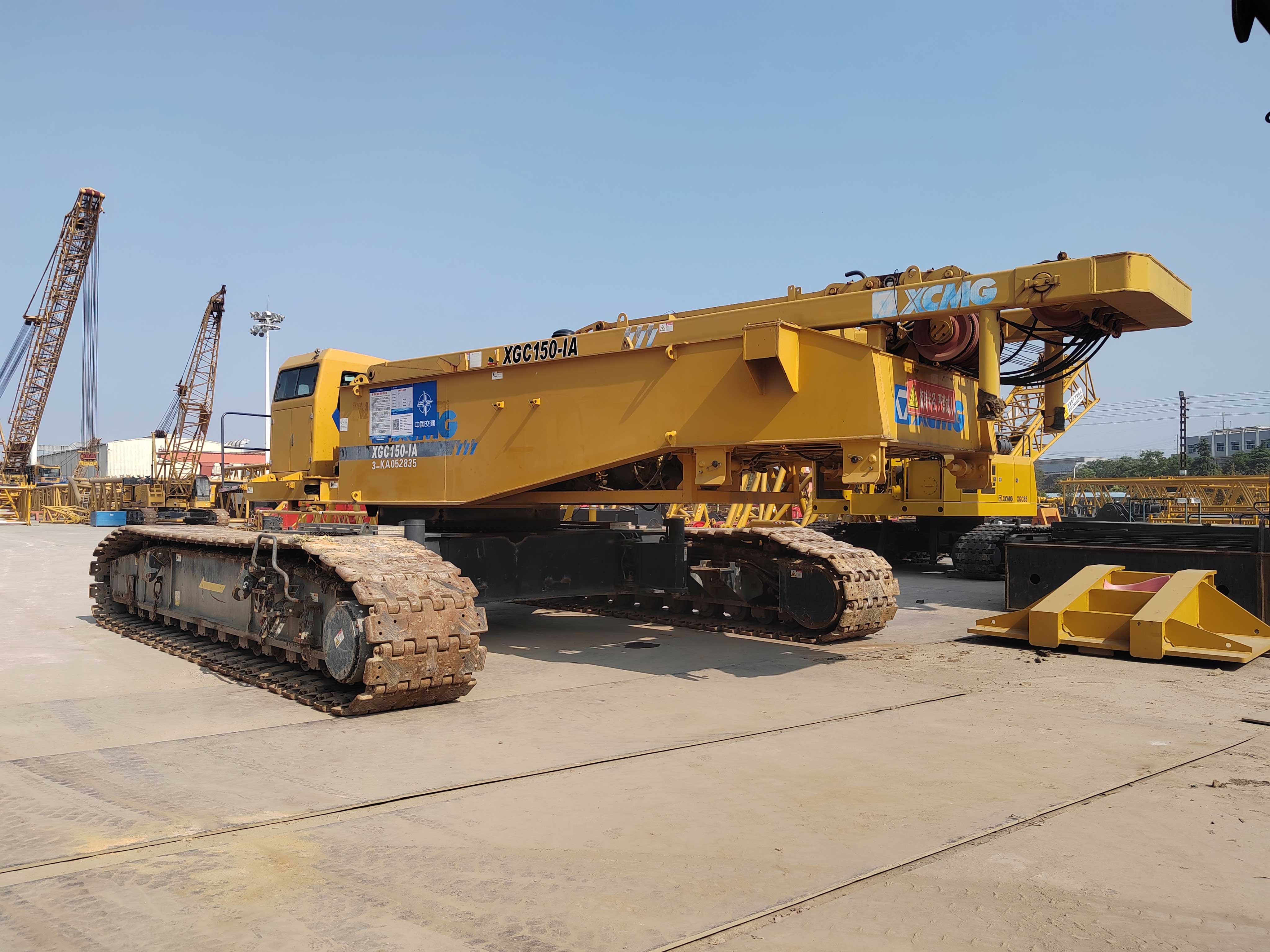 Wide-angle-shot-of-a-used-crawler-crane-on-rough-terrain Wide-angle-shot-of-a-used-crawler-crane-on-rough-terrain