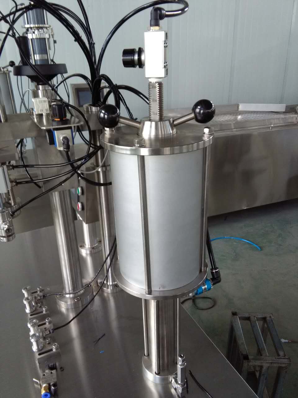 Semi-automatic Aerosol Filling Machines Definition