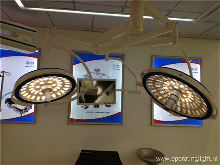 Operating surgical lamp with double heads