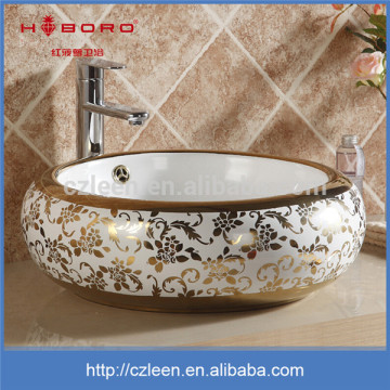 Luxury hotel interior decoration bathroom countertop golden wash basin