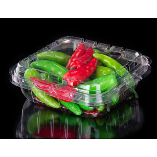 Caja de embalaje de fruta de plástico con rejillas de ventilación.