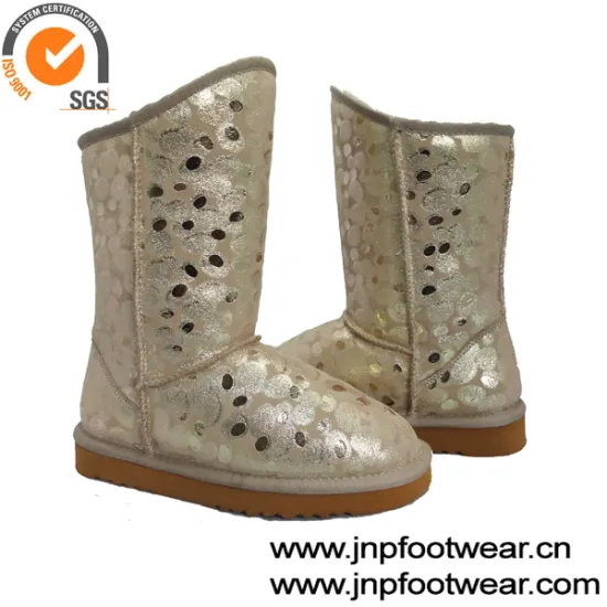 Women fur lined leather boots in gold pattern leather