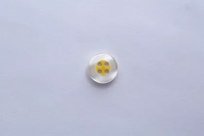 Transparent buttons on the bottom of the shirt