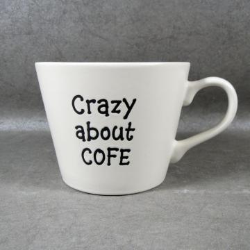 Tazza da caffè in ceramica bianca