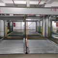 Sistema eficiente de estacionamiento de rompecabezas de dos niveles