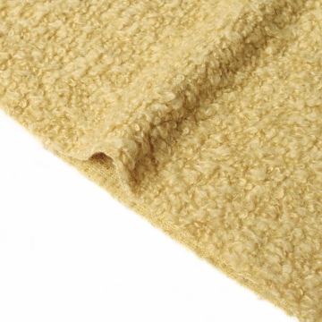 ຜ້າສີເຫຼືອງອ່ອນໆທີ່ມີສີຂາວສໍາລັບເສື້ອກັນຫນາວ