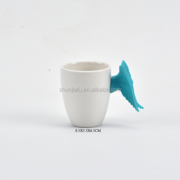 New Style Wholesale Ceramic Coffee Mug with Silicone Angel Wing Handle