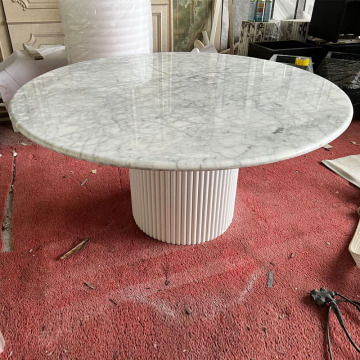 Mesa de comedor redondo de mármol blanco minimalista