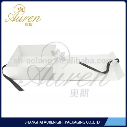 Plain white folding apparel boxes with ribbon