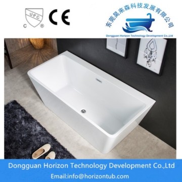 White glossy acrylic bathtub