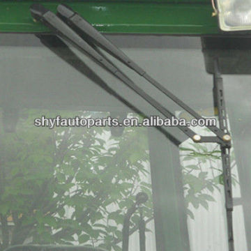 Tractor windshield wiper blade and wiper arm