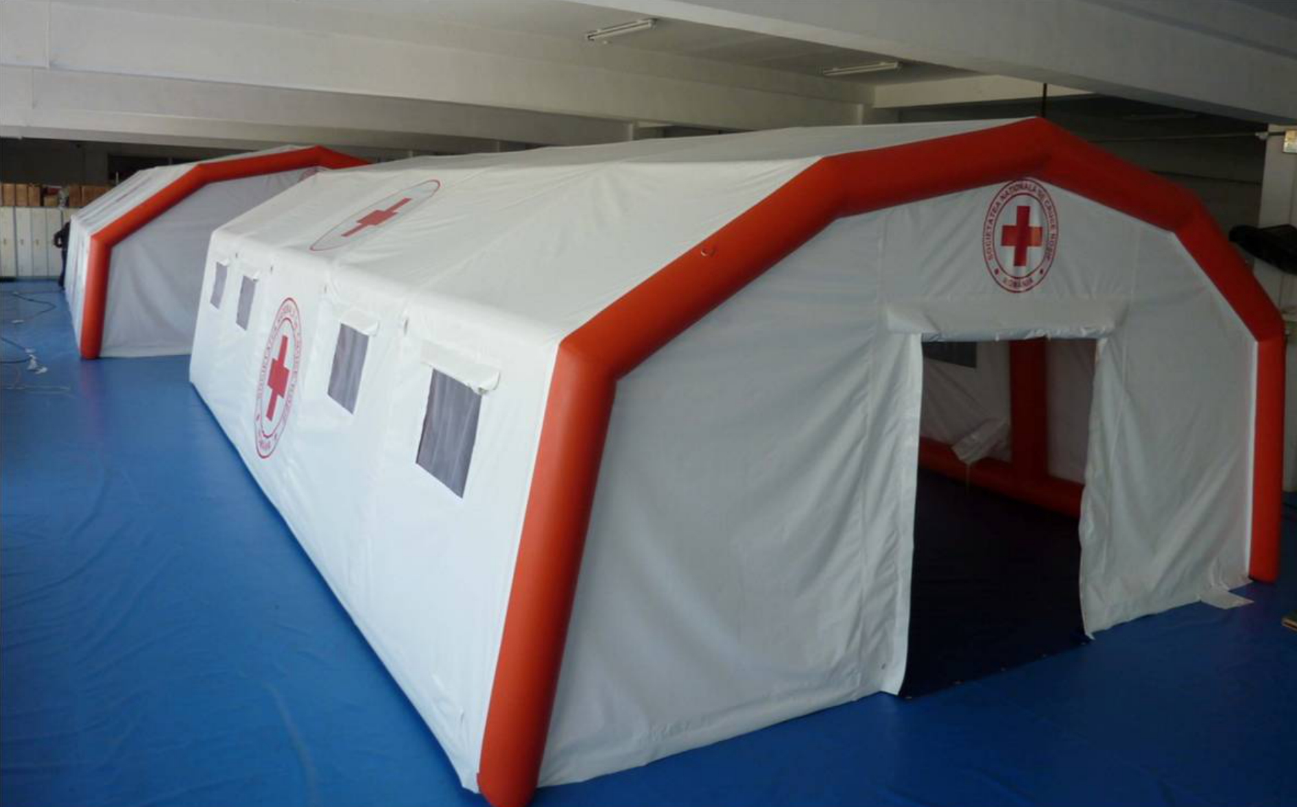 Medical rescue tent with red cross marking