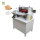 Automatic sticker roll to sheet cutting machine