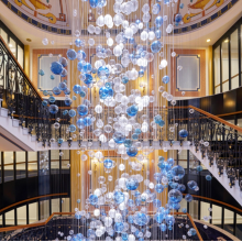 Large glass chandelier in hotel lobby