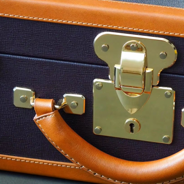 High Steamer Trunk with Stamped Clasps and Solid Brass Corners and Handles