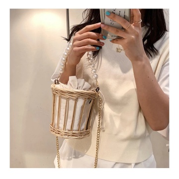 2021 pearl handle pierced bucket straw lady bag