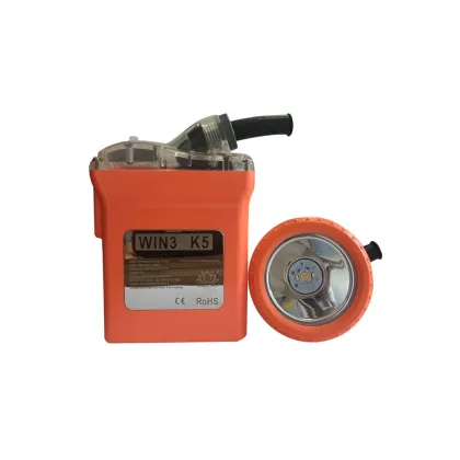 Corded  cap lamp with laser