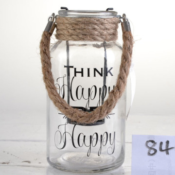 clear glass hurricane with handle