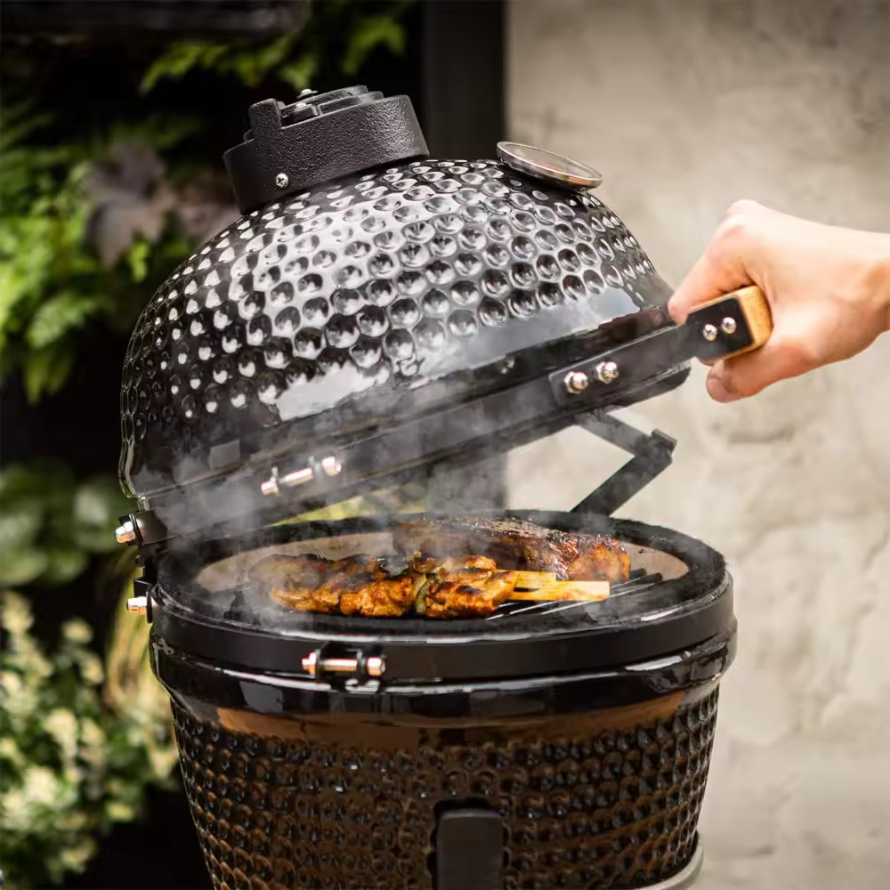 Portable ceramic charcoal grill