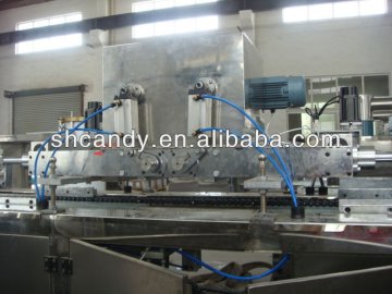 single head piston chocolate depositor Chocolate enrobing line