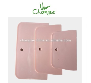Pink plastic spreader set