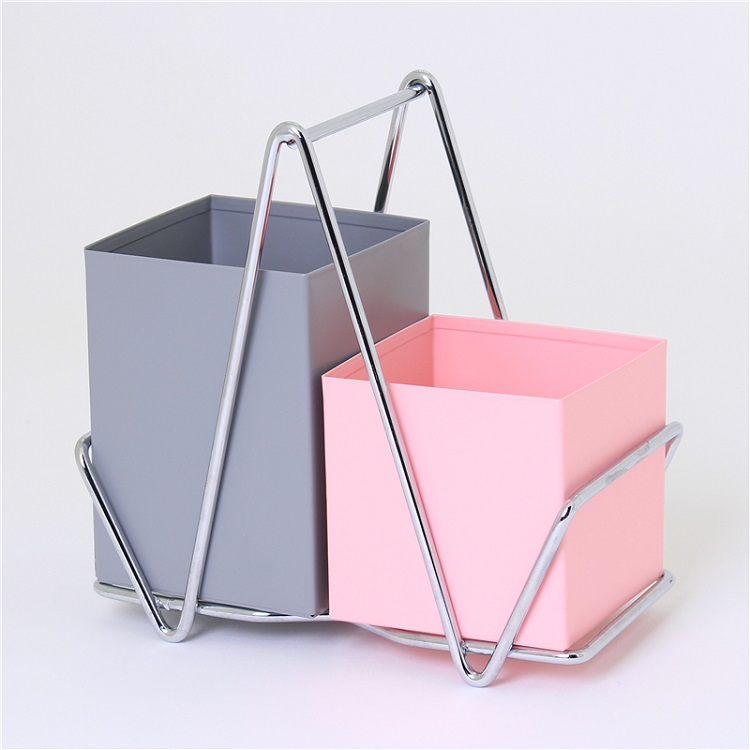 blue and pink kitchen utensils holder