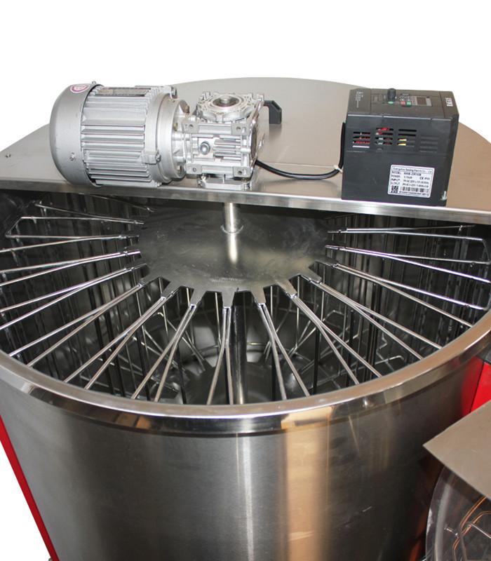 Fully automatic honey extractor reversible used for honey processing with 24 frames