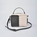 Black and white leather handbag with Top Handle