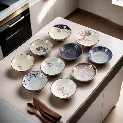 Classic Asian Bowls and Plates with Fish and Flower Motifs