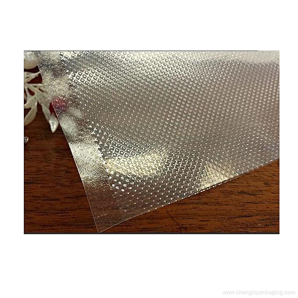 Embossed vacuum sealer bags and rolls