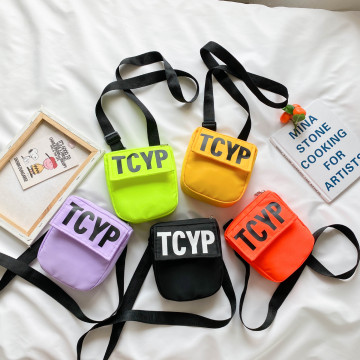 Letter shoulder bag men and women baby waist bag lil girls purses nylon messenger candy color kids bag