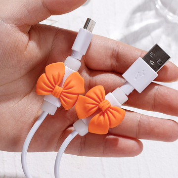 Cable Protector: Cute Bow Design Data Line Cover for Mobile Phone, USB Charger Cord, and Winder Protection